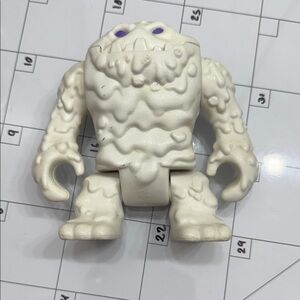 Fisher-Price White Snow Monster Figure with Purple Eyes